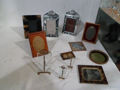 a table with a lot of pictures and pictures on it