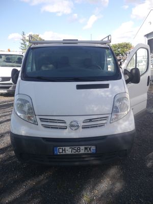 a white van that is parked in the parking lot