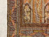 a close up of a piece of cloth with a design on it