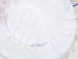 a close up of a plastic cup with a straw in it