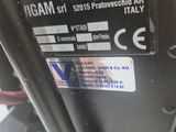 a close up of a motor bike with a sticker on it