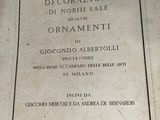 an old book that is sitting on a table