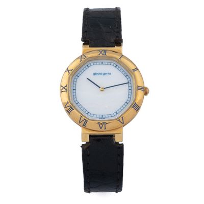 a close up of a wrist watch with roman numerals on it