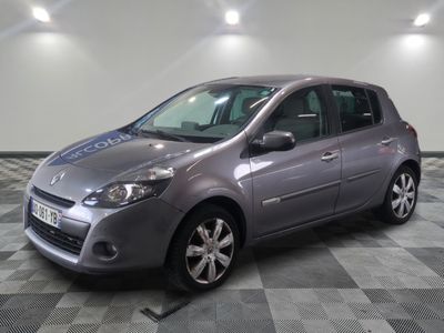 a picture of a silver car parked in a garage