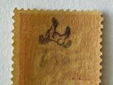 a stamp with a picture of a man on a horse on it