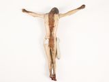 a statue of jesus on the cross on a white background