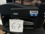 a black printer sitting on top of a table