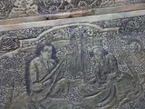 a silver box with a picture of a man and a woman on it