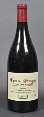 a bottle of wine that is sitting on a table