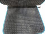 a black and blue seat cover with a blue trim
