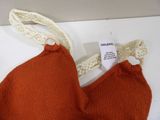 an image of a close up of a bra top with a tag on it