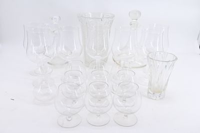 a lot of empty wine glasses sitting on a table