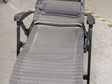an image of a lawn chair in a garage