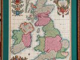 an old map of the british isles in a wooden frame