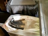 a box with a knife in it sitting on top of a table
