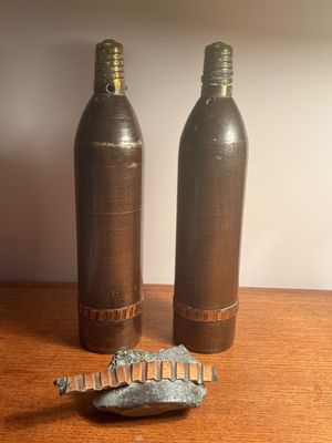 two bottles that are sitting on a table next to each other
