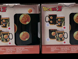 two boxes of dragon ball coffee mugs are shown in the box