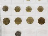 a lot of coins that are on the table