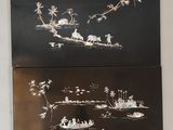 deux tableaux en noir et blanc accrochés l'un à côté de l'autre sur le mur