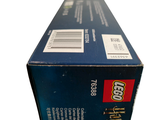 a box of legos sitting on a white surface