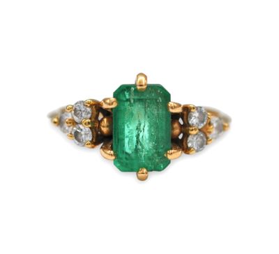 an emerald and diamond ring