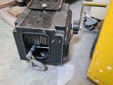 a small machine that is sitting on a pallet