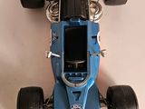 a blue race car that is sitting on a table