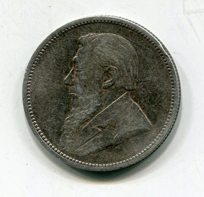 an old coin with a picture of a man on it