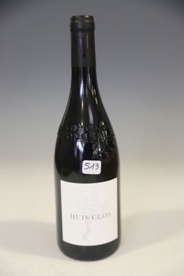 a bottle of wine that is sitting on a table