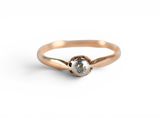 an image of a rose cut diamond ring on a white background