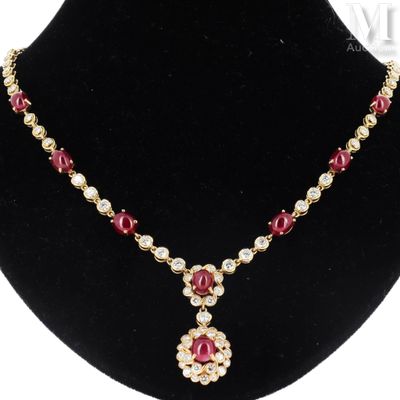 a close up of a necklace on a mannequin display