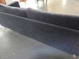 a couch that is sitting on a table in a room
