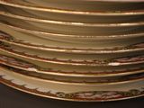many plates stacked on top of each other on a table