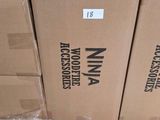 many boxes stacked on a pallet in a warehouse