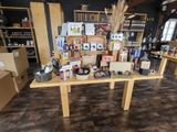 a table with a lot of items on it in a room