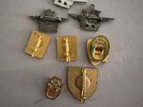 a lot of metal items that are laying on a table