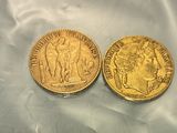 two gold sovereigns, one of which is a sovereign and the other of which is a sovereign