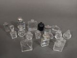 a lot of glass bottles that are sitting on a table