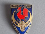 an image of a badge with a rooster on it