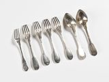 six forks and spoons are arranged in a row on a white surface
