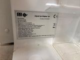 a close up of a microwave with the door open