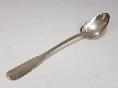a spoon that is sitting on a table