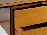 a wooden desk with two drawers and a drawer underneath it