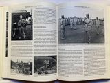 an open book with pictures of military men on it