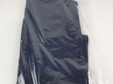 a plastic bag with a pair of pants in it
