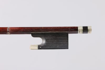 a close up of a violin bow on a white background