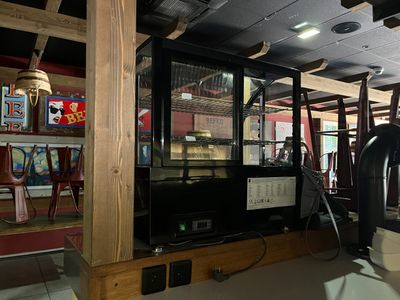 a vending machine in the middle of a room