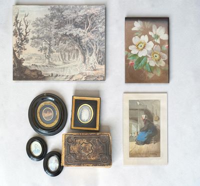 a picture of a collection of antique items on a table