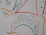a drawing of a man with a hat on a sheet of paper