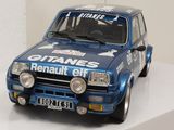 a toy car that is sitting on a white shelf